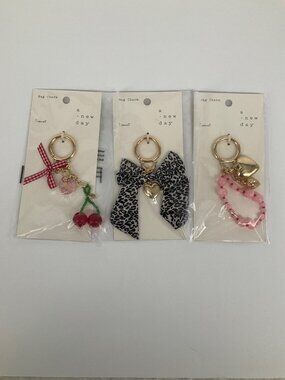 A New Day set of 3 Bag Charms Cherry, Cheetah Bow, Strawberry Heart. NEW